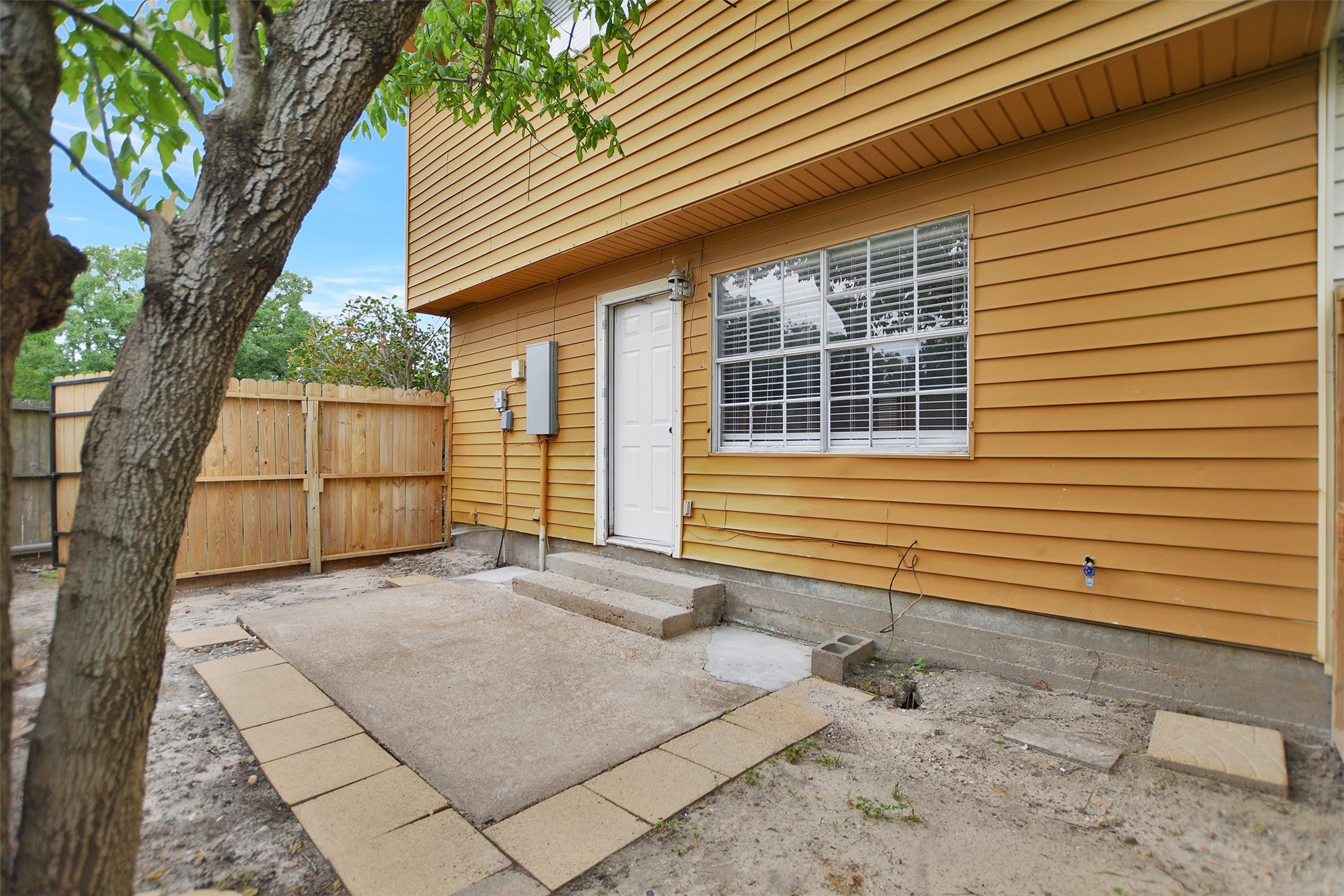 3826 Willow Springs Lane, Unit 3826 Houston, TX 77080 - Photo 42 of 43 a view of a house with a backyard