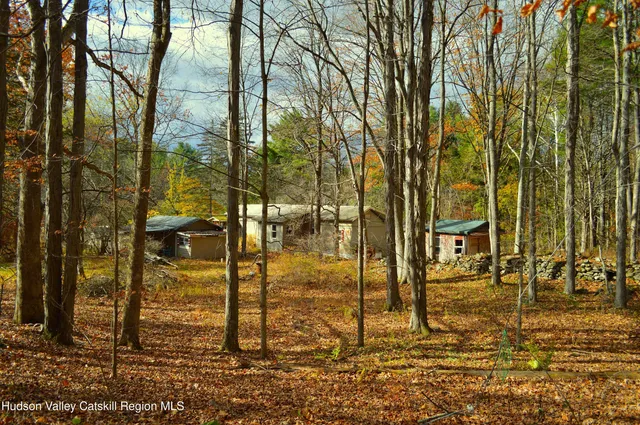 a view of pool of water with yard