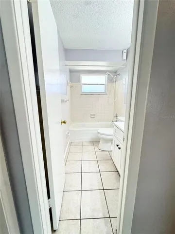 a house view with a backyard space