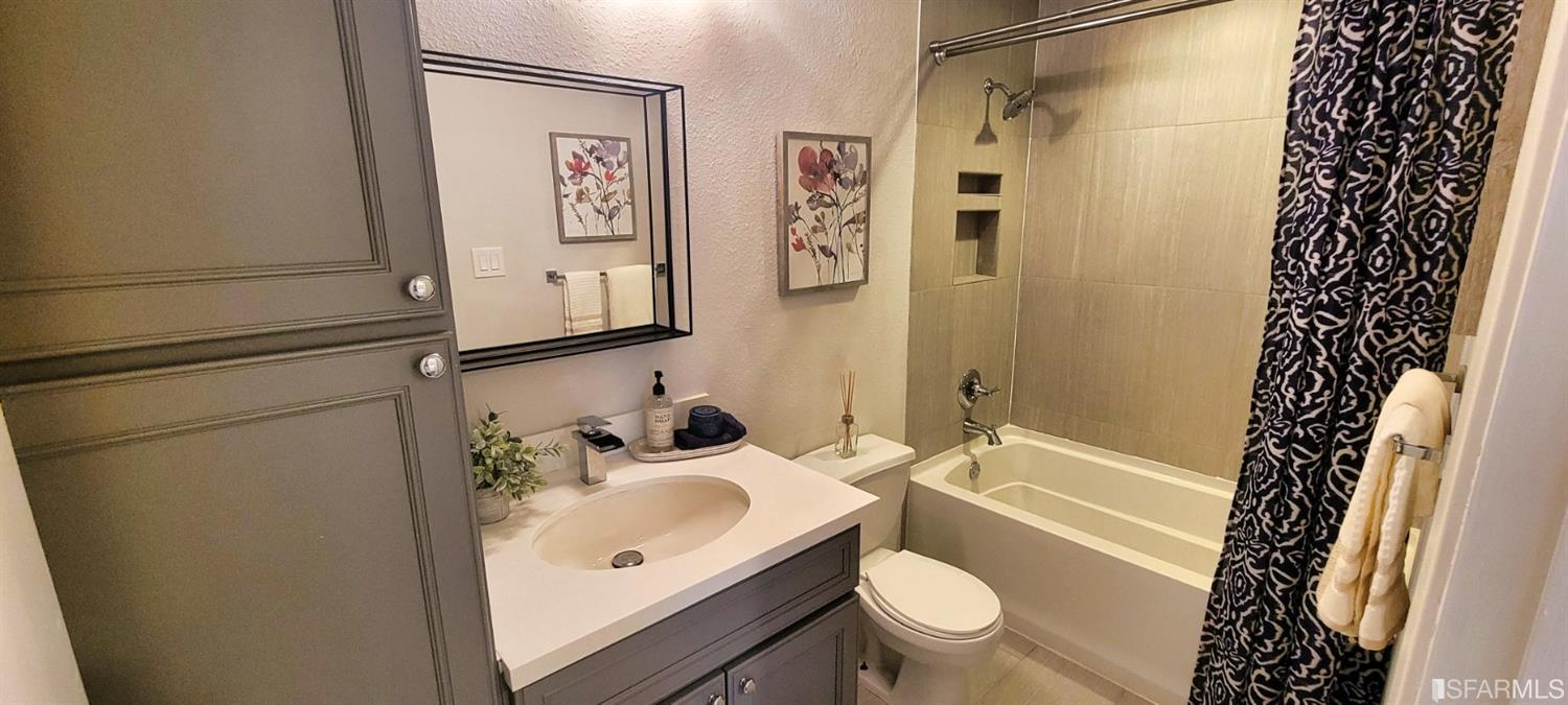 1200 Kenwal Road, Unit D Concord, CA 94521 - Photo 6 of 14 a bathroom with a sink toilet and shower
