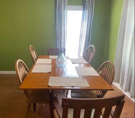 a view of a dining room with furniture