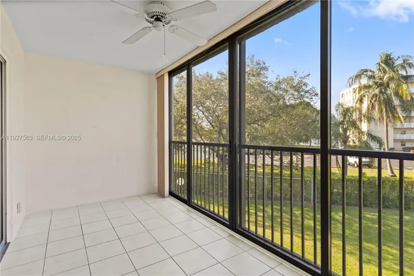 a view of a room with a large window