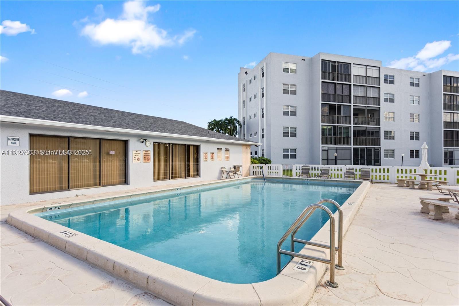 190 Southeast 5th Avenue, Unit 202 Dania Beach, FL 33004 - Photo 34 of 36 a view of swimming pool with outdoor seating