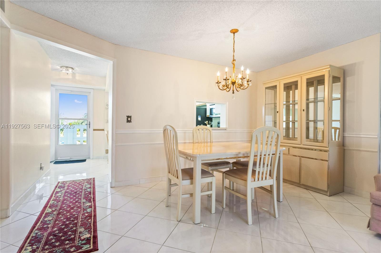 190 Southeast 5th Avenue, Unit 202 Dania Beach, FL 33004 - Photo 8 of 36 a dining room with furniture and window