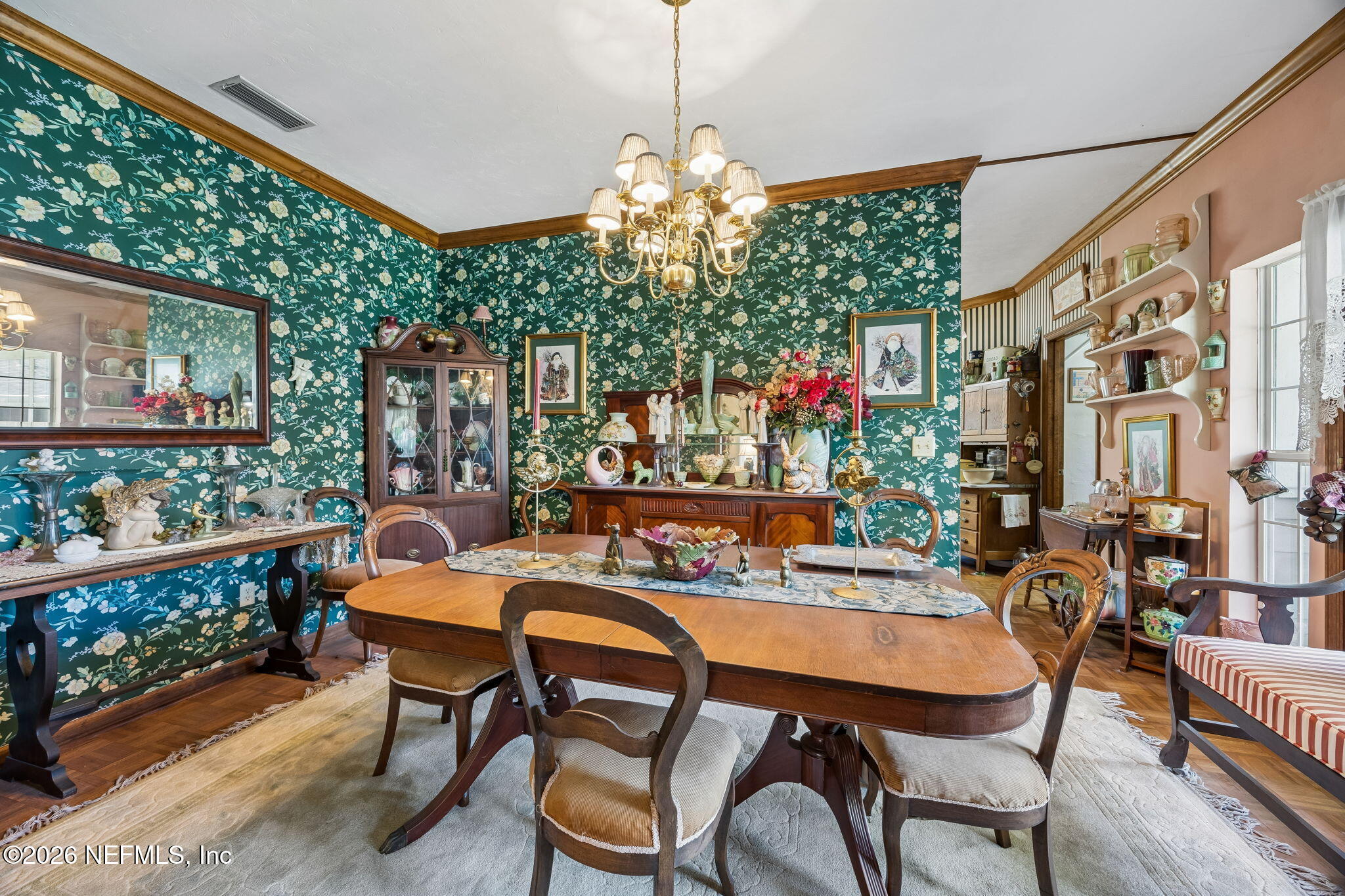 7430 Southwest County Road 18 Hampton, FL 32044 - Photo 20 of 72 a view of a dining room with furniture a chandelier and wooden floor