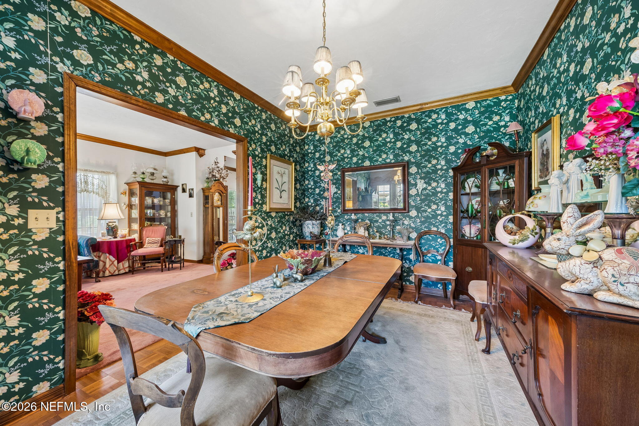 7430 Southwest County Road 18 Hampton, FL 32044 - Photo 21 of 72 a view of a dining room with furniture and a chandelier