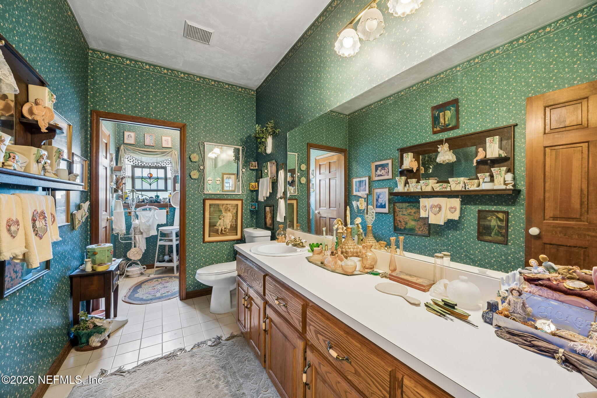 7430 Southwest County Road 18 Hampton, FL 32044 - Photo 29 of 72 a kitchen with a sink stove and a living room