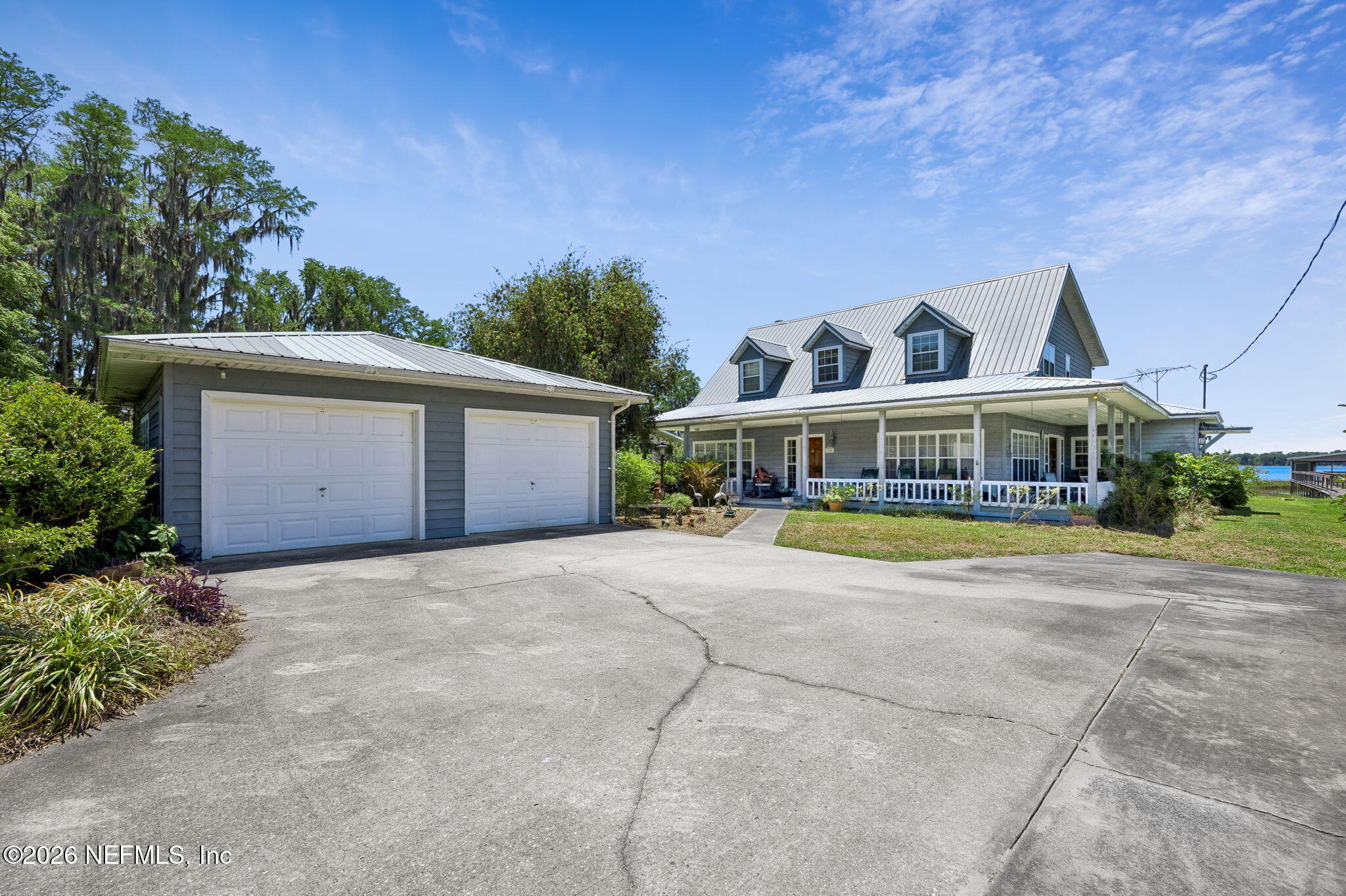 7430 Southwest County Road 18 Hampton, FL 32044 - Photo 4 of 72 a view of house with outdoor space and swimming pool