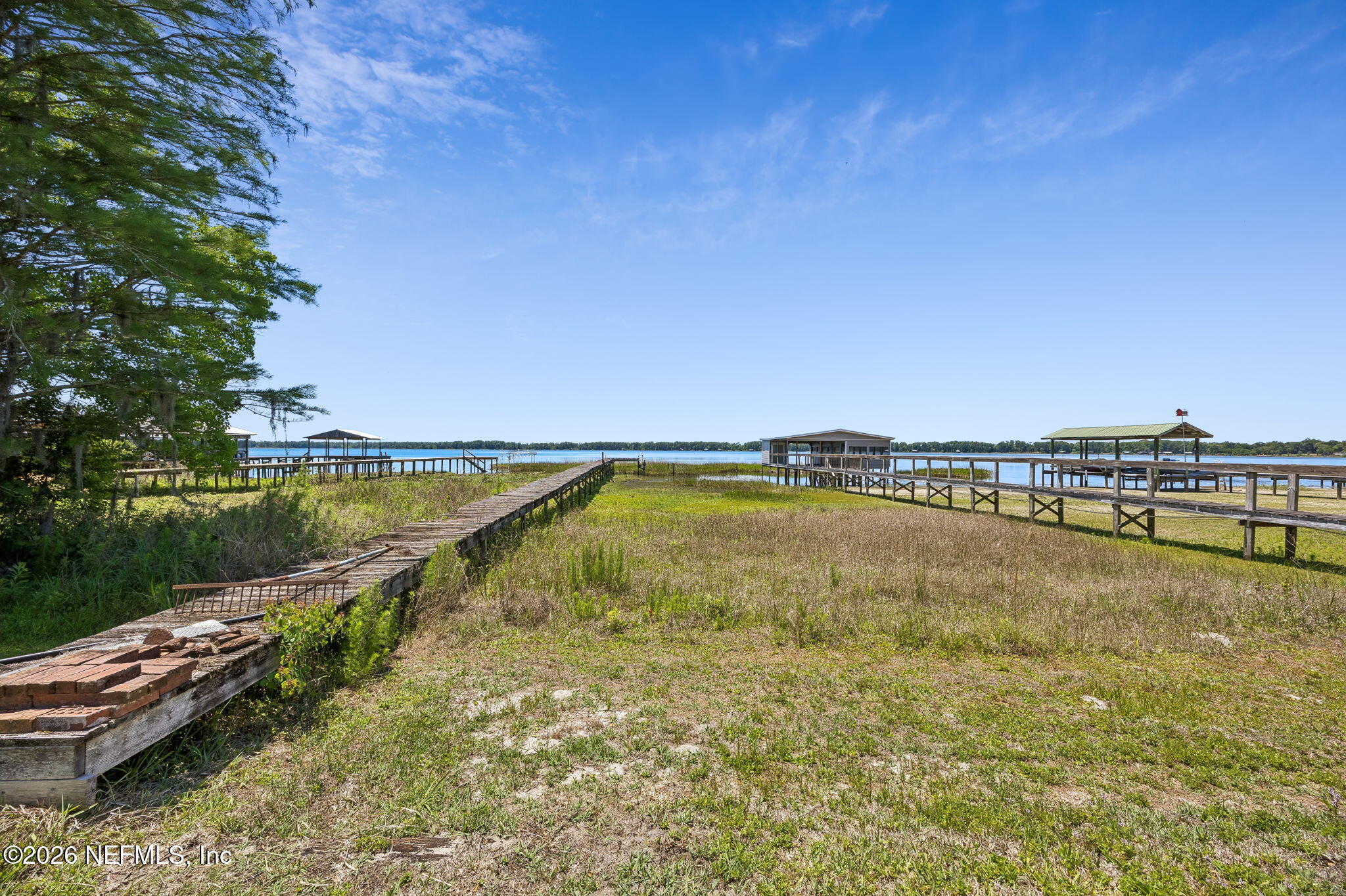 7430 Southwest County Road 18 Hampton, FL 32044 - Photo 49 of 72 a view of a lake with a big yard