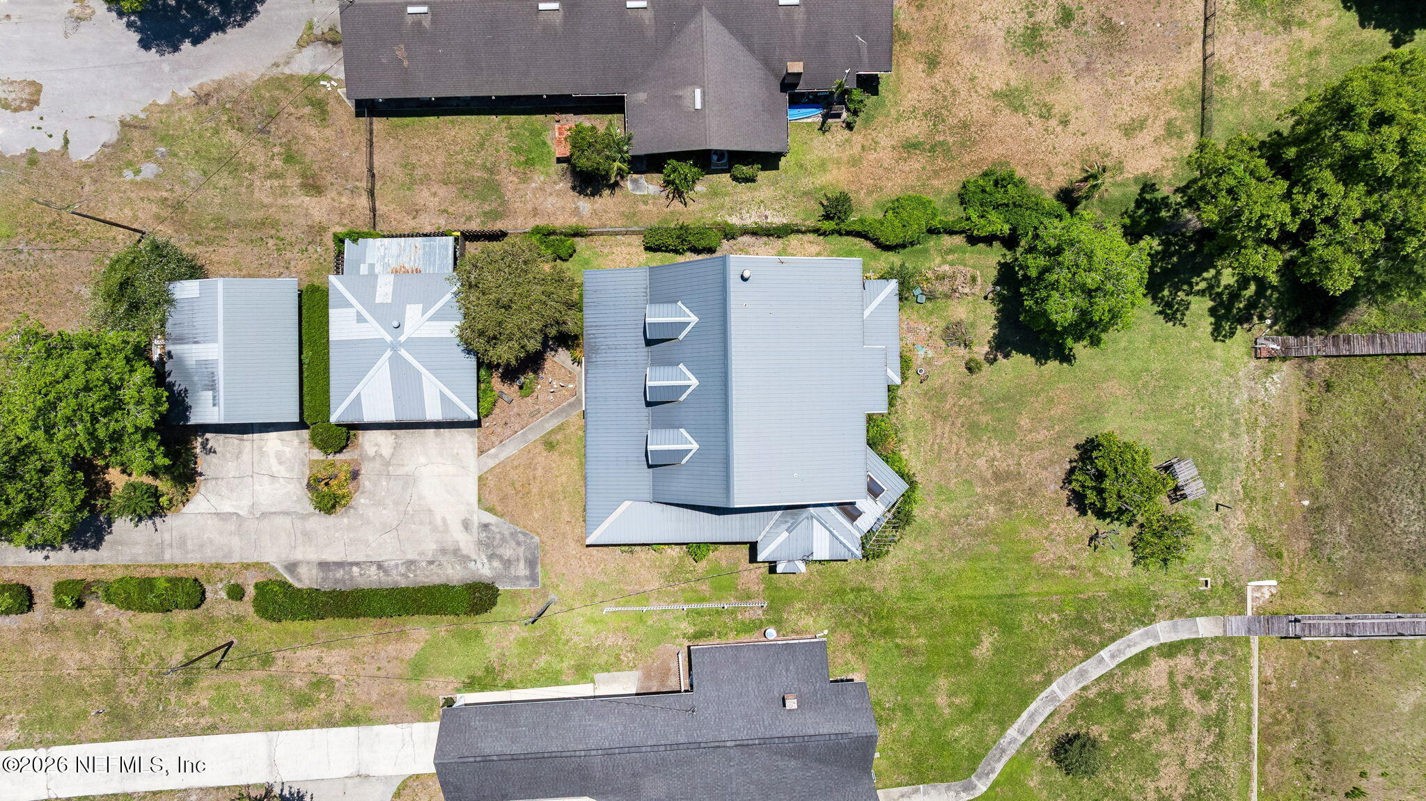 7430 Southwest County Road 18 Hampton, FL 32044 - Photo 54 of 72 an aerial view of a house with outdoor space and lake view