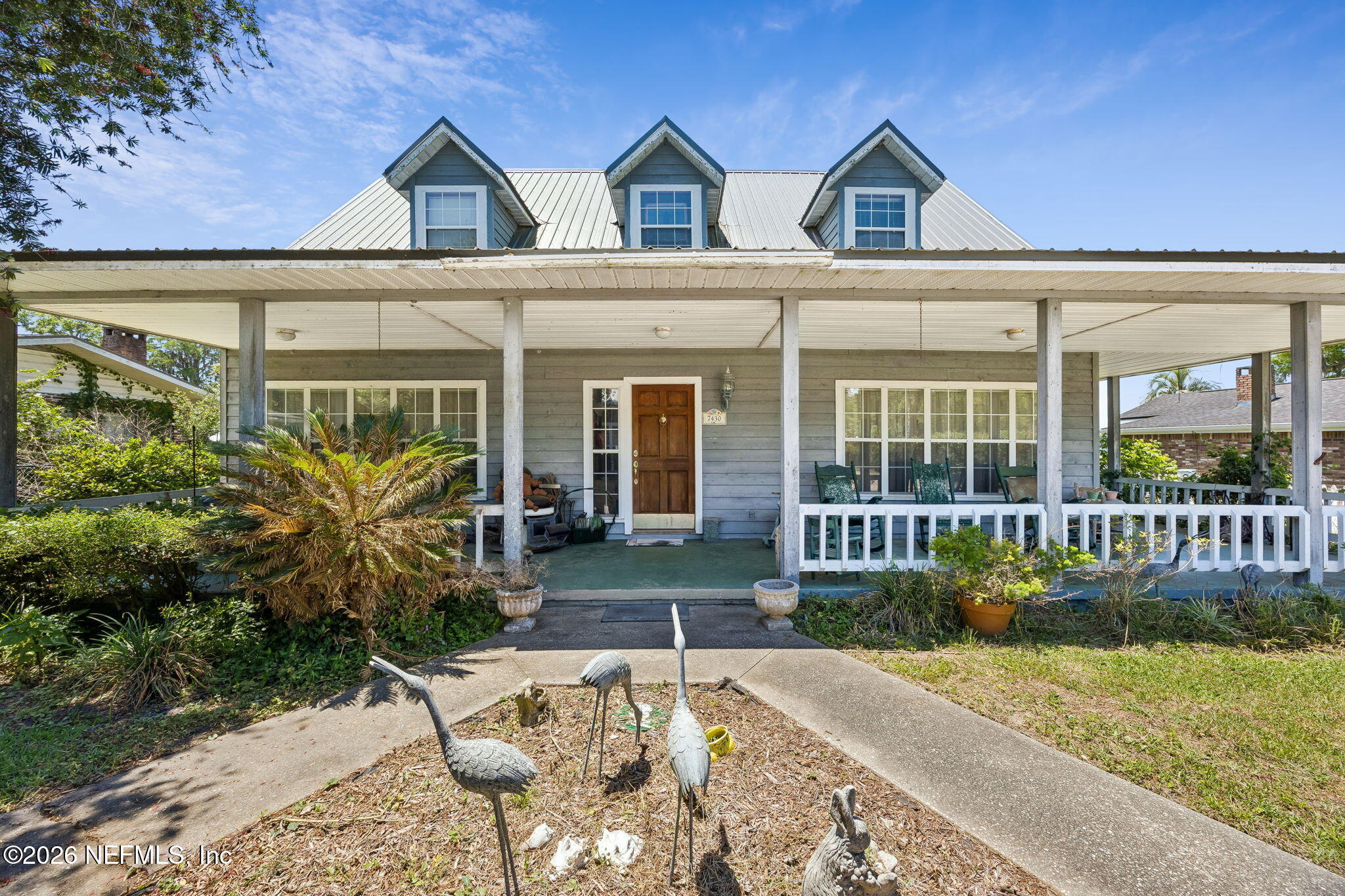 7430 Southwest County Road 18 Hampton, FL 32044 - Photo 6 of 72 front view of a house with a yard