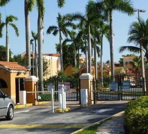 6280 Northwest 186th Street, Unit 311 Hialeah, FL 33015 - Photo 1 of 19 a view of a park with palm trees