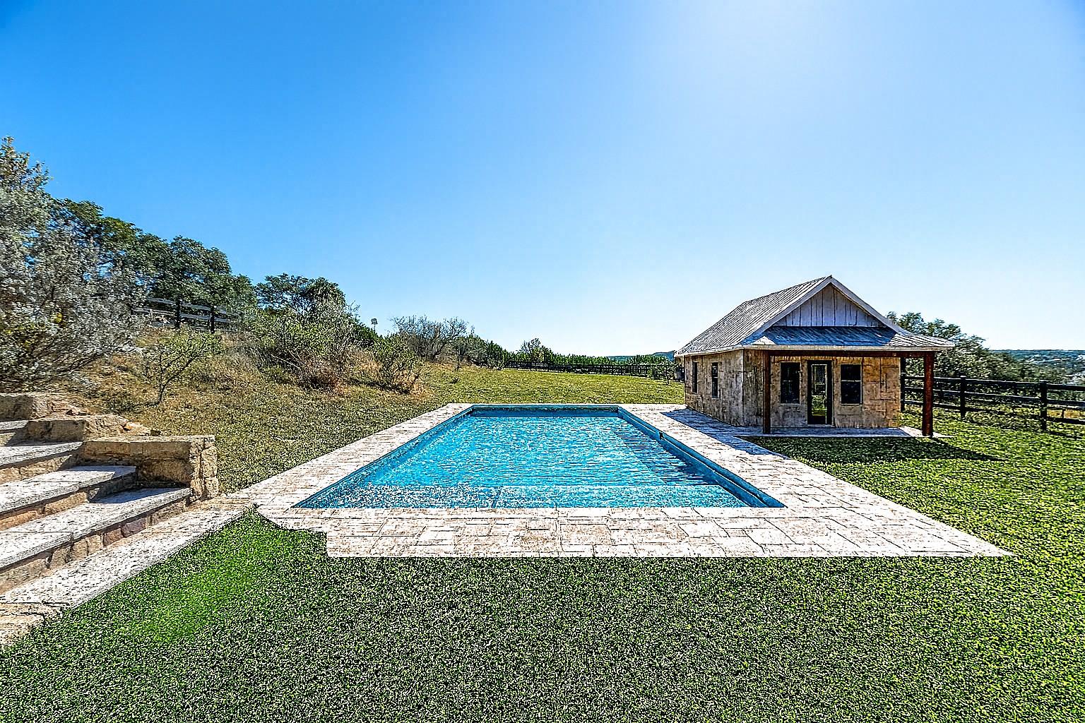 109 Ranchers Club Lane Driftwood, TX 78619 - Photo 18 of 19 Virtually staged pool and pool house added for reference