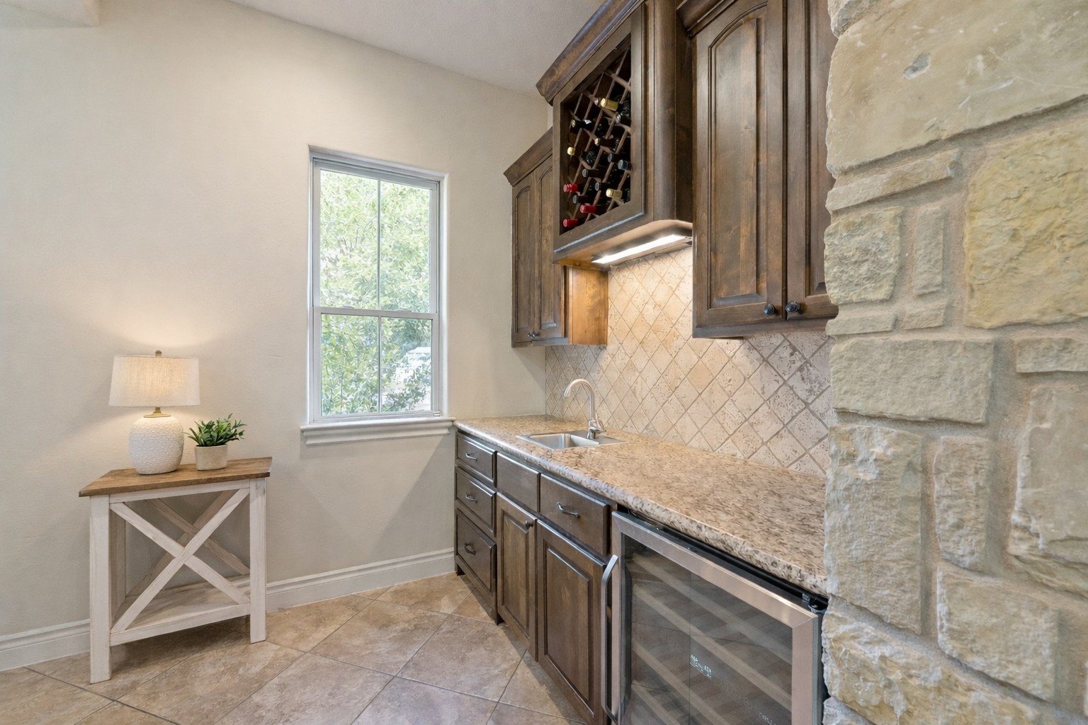 109 Ranchers Club Lane Driftwood, TX 78619 - Photo 8 of 19 Wet bar adjacent to formal dining area