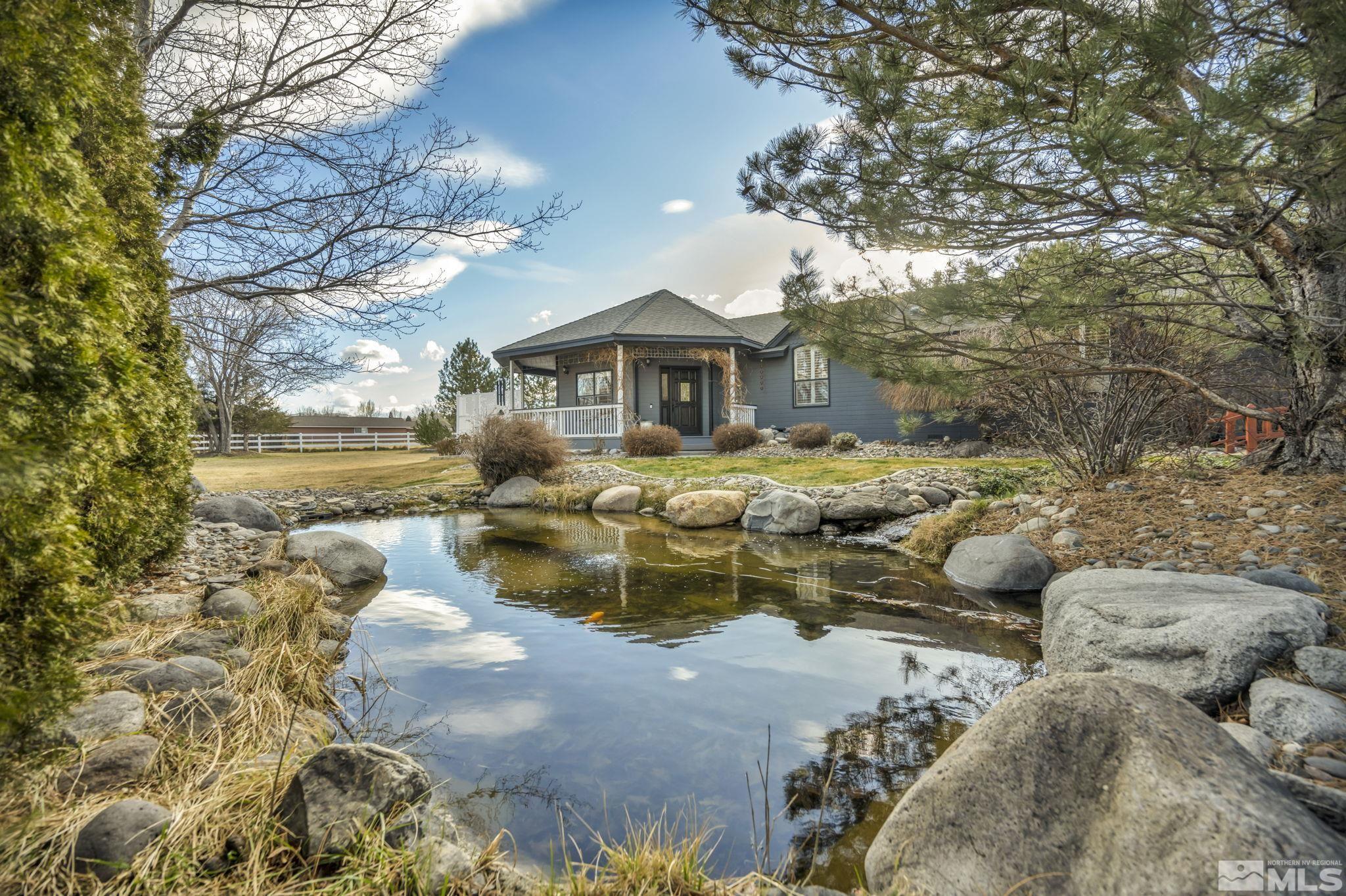 9811 Dixon Lane Reno, NV 89511 - Photo 1 of 40 a view of swimming pool with outdoor seating