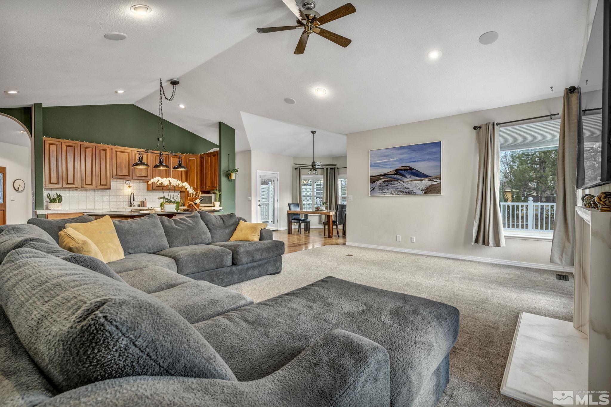 9811 Dixon Lane Reno, NV 89511 - Photo 11 of 40 a living room with furniture and a large window