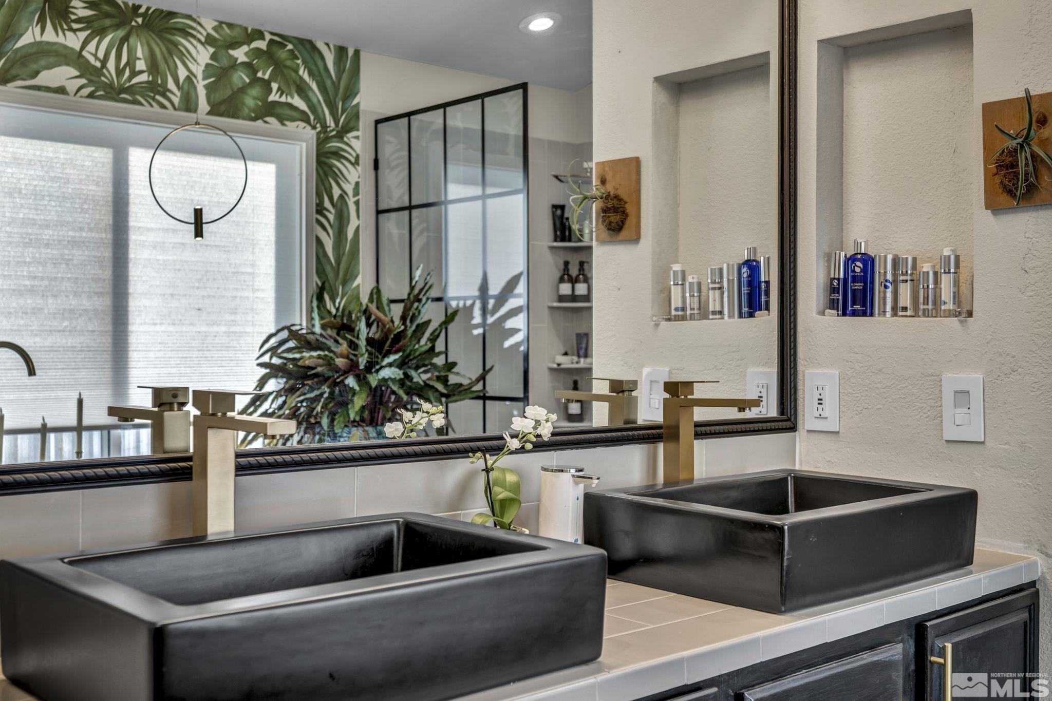 9811 Dixon Lane Reno, NV 89511 - Photo 16 of 40 a kitchen with a sink and a refrigerator