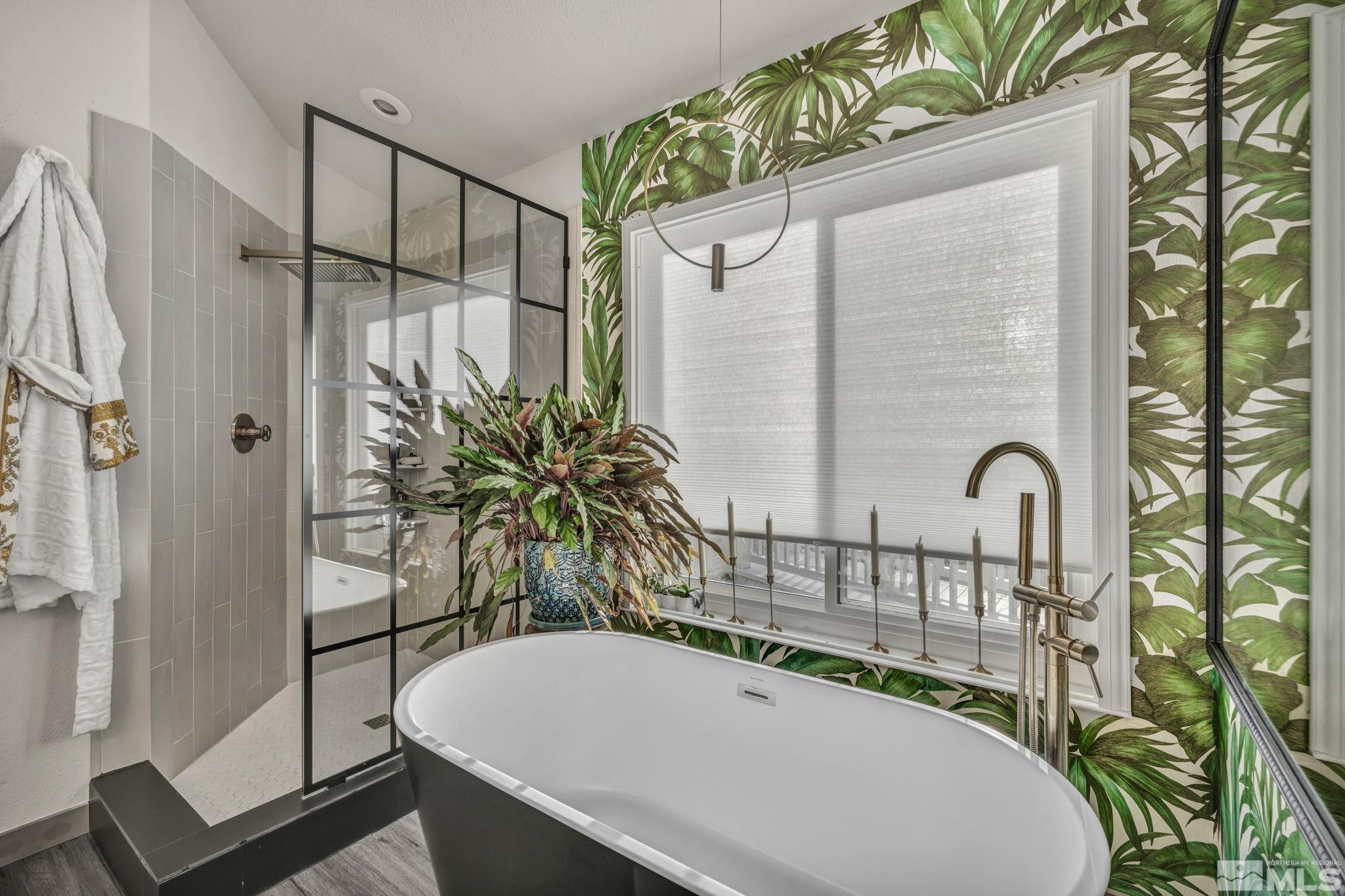 9811 Dixon Lane Reno, NV 89511 - Photo 17 of 40 a bathroom with a bathtub and shower