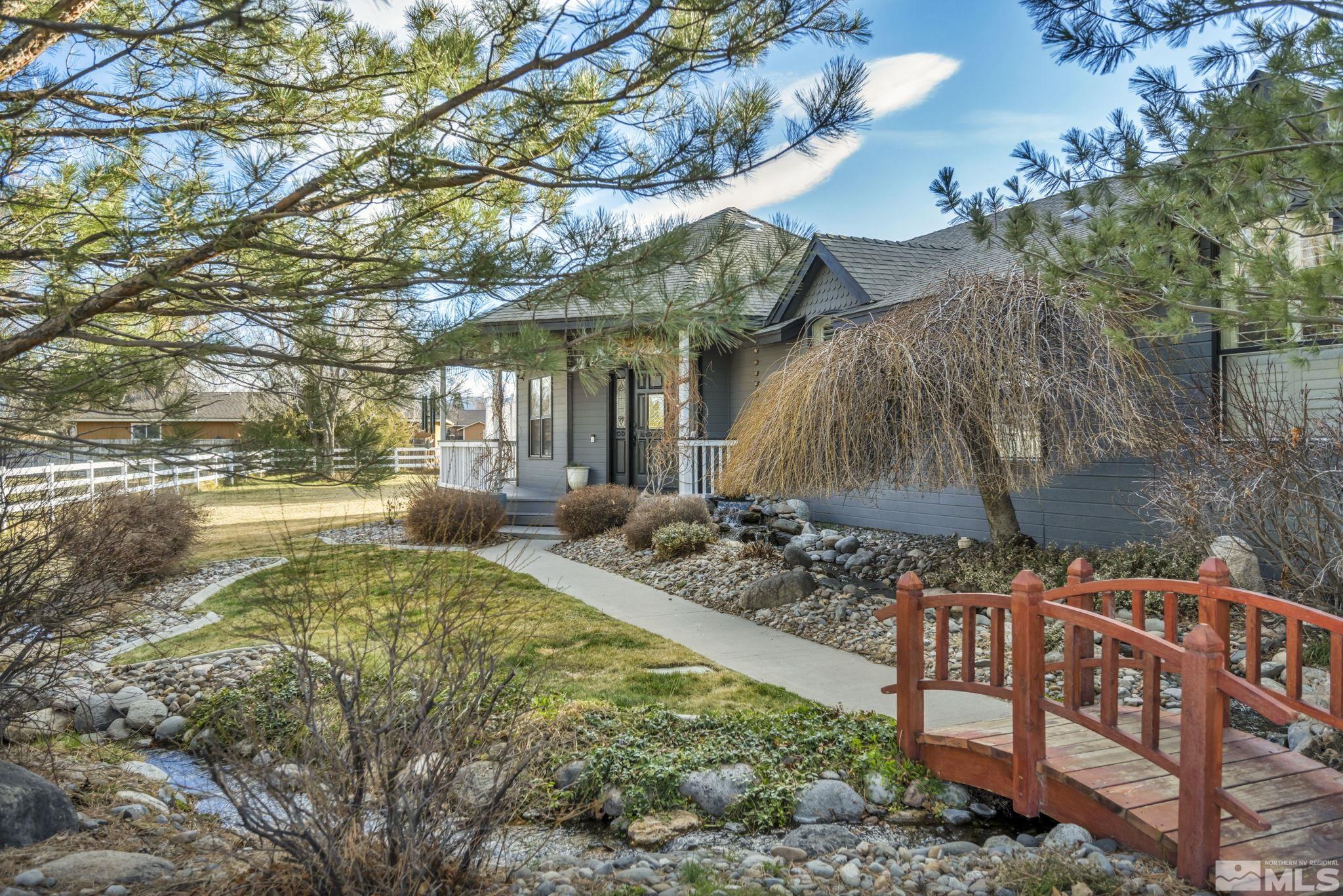9811 Dixon Lane Reno, NV 89511 - Photo 2 of 40 a view of a backyard with sitting area