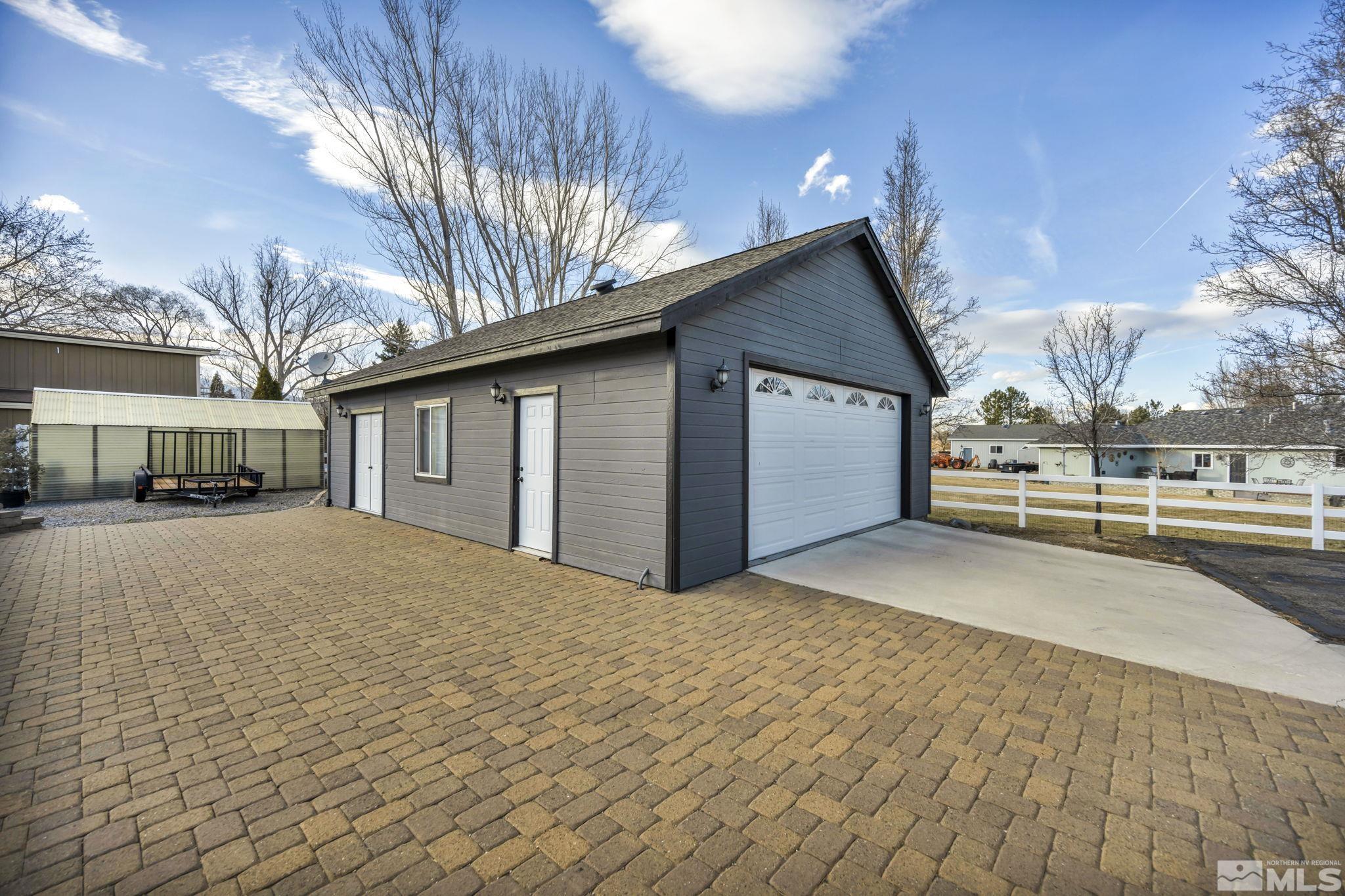 9811 Dixon Lane Reno, NV 89511 - Photo 30 of 40 a view of a house with a yard