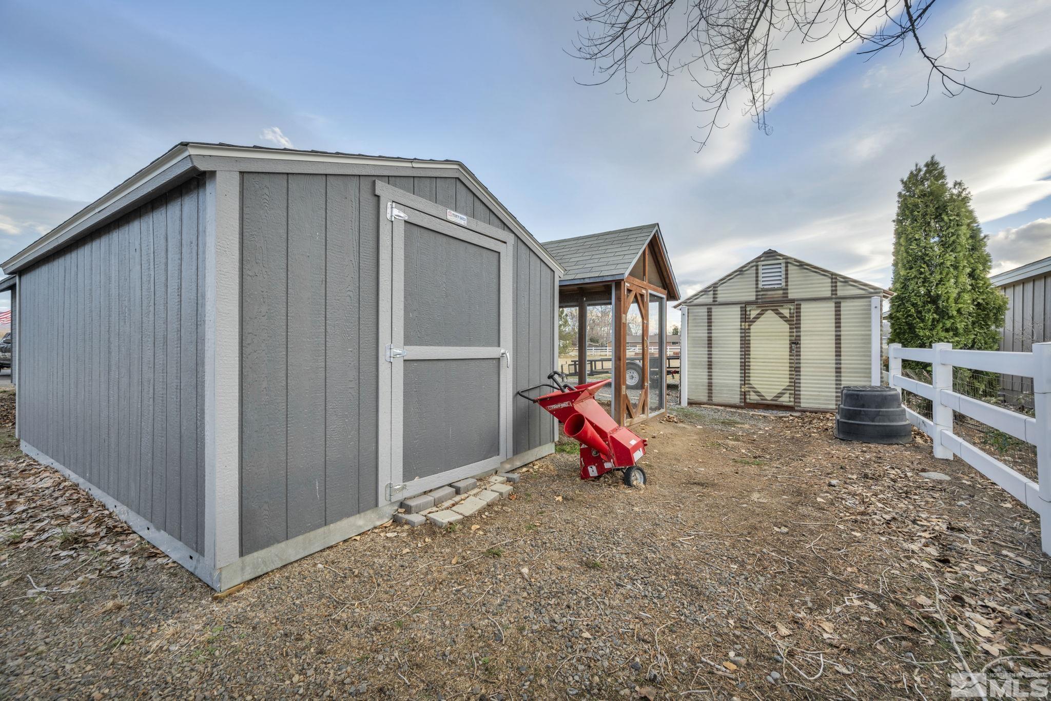 9811 Dixon Lane Reno, NV 89511 - Photo 33 of 40 a view of an house with backyard and entertaining space