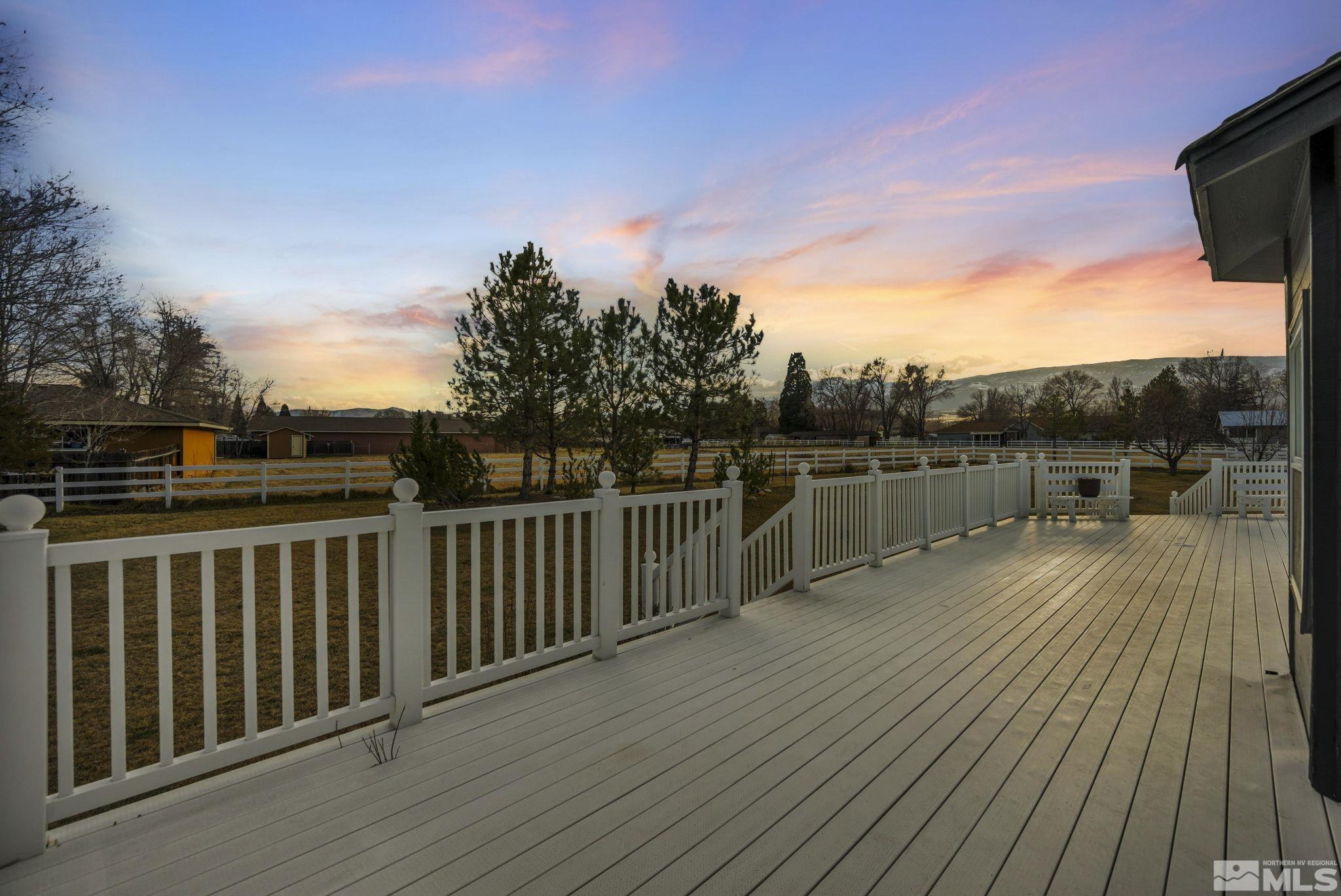 9811 Dixon Lane Reno, NV 89511 - Photo 39 of 40 a view of balcony with wooden floor and fence