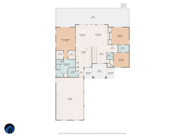 a kitchen with stainless steel appliances granite countertop a refrigerator a sink dishwasher a stove and a dining table with wooden floor