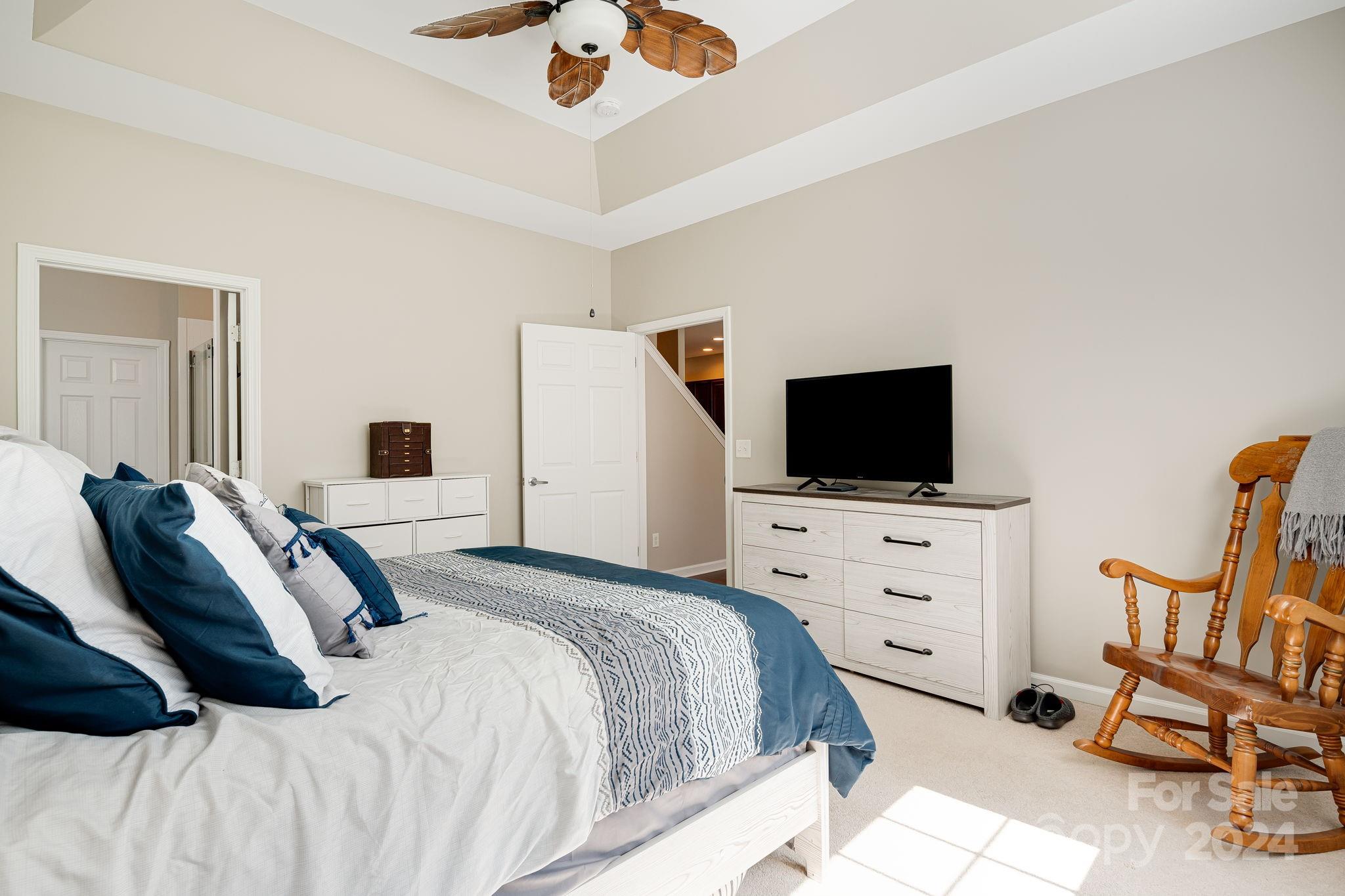 101 Ledbetter Road Arden, NC 28704 - Photo 13 of 34 a bedroom with a bed and a flat screen tv