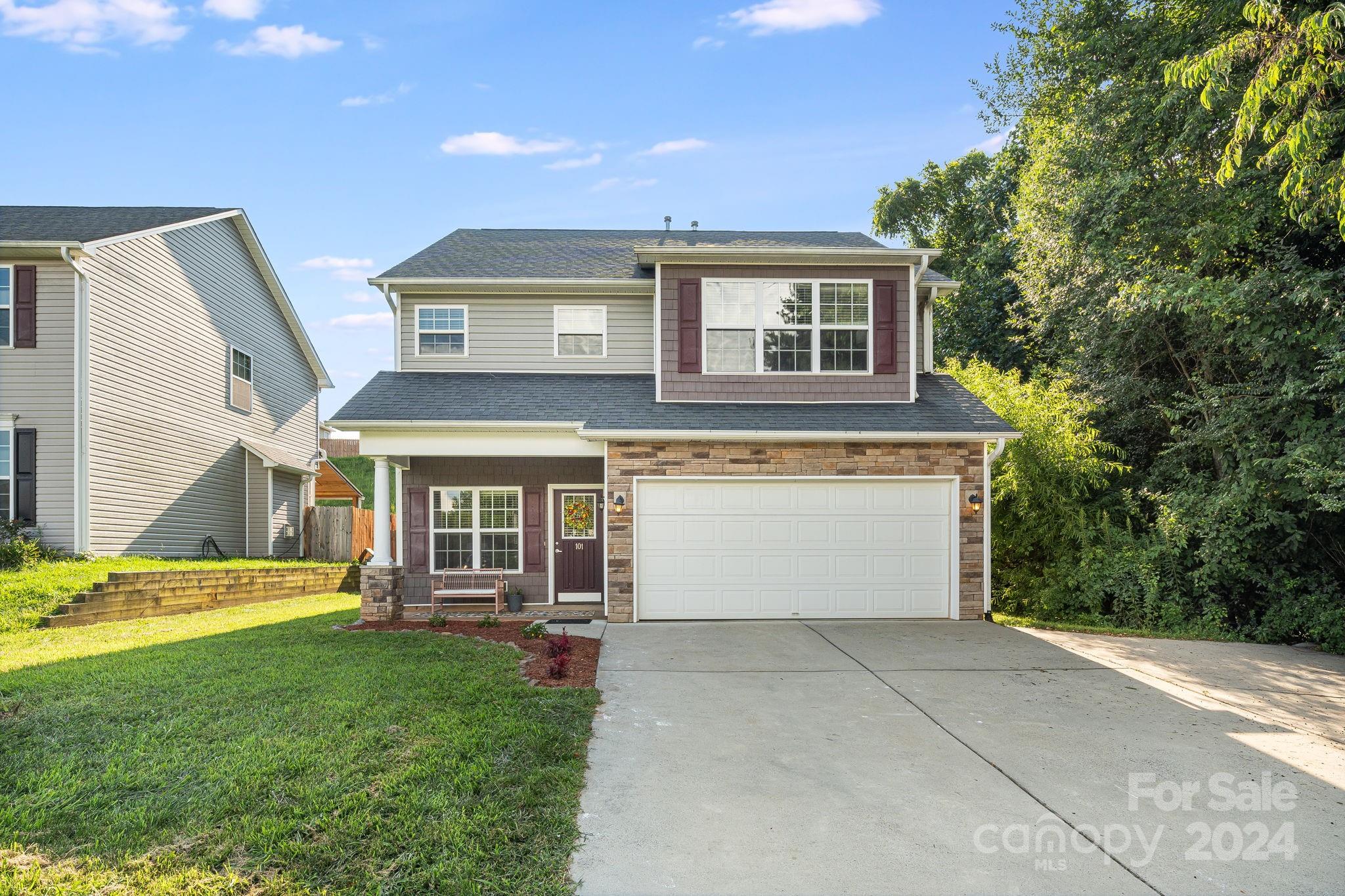 101 Ledbetter Road Arden, NC 28704 - Photo 2 of 34 a view of a house with a backyard