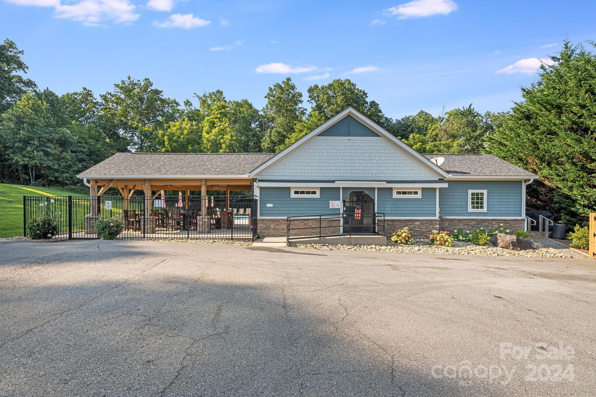 101 Ledbetter Road Arden, NC 28704 - Photo 30 of 34 a front view of a house with a garden