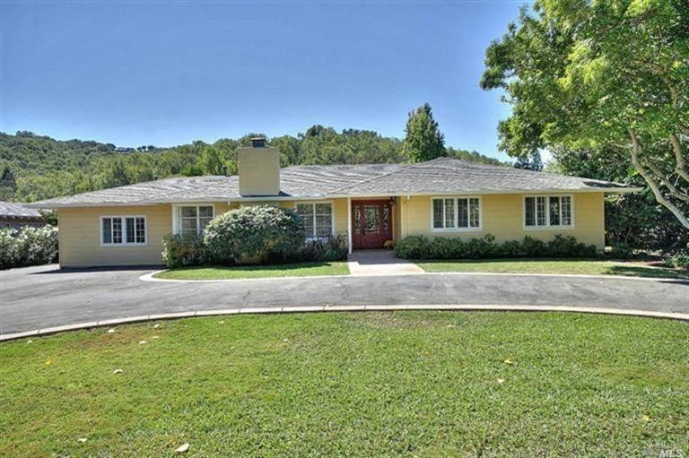 1319 Butterfield Road San Anselmo, CA 94960 - Photo 1 of 1 a front view of a house with a garden