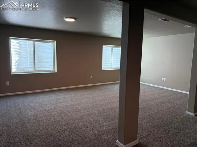 an empty room with a window