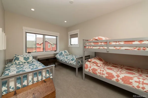 a bedroom with furniture and a bed