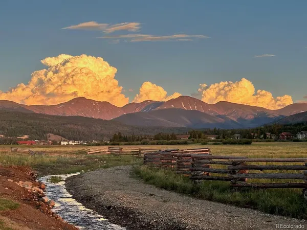 a view of lake with mountain