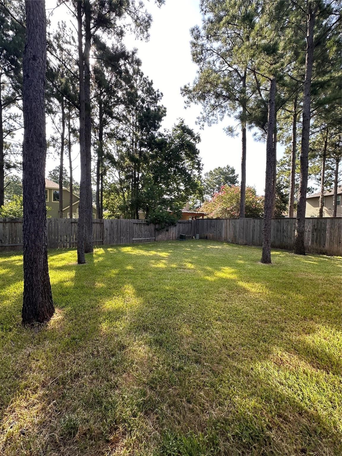 175 West New Harmony Trail Spring, TX 77389 - Photo 15 of 16 a view of yard with swimming pool and trees