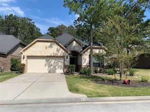 175 West New Harmony Trail Spring, TX 77389 - Photo 16 of 16 a front view of a house with garden