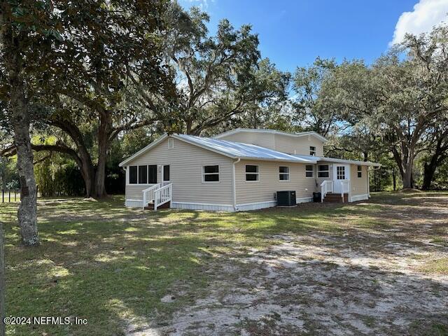 4779 Southwest 119th Loop Lake Butler, FL 32054 - Photo 1 of 49 Front from 119th Loop