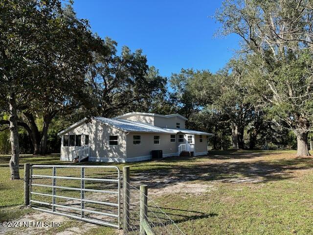 4779 Southwest 119th Loop Lake Butler, FL 32054 - Photo 2 of 49 Front view 6