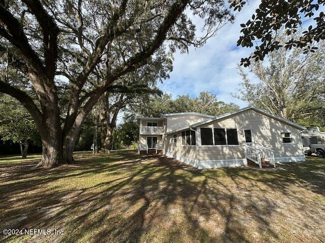 4779 Southwest 119th Loop Lake Butler, FL 32054 - Photo 3 of 49 Front view 4