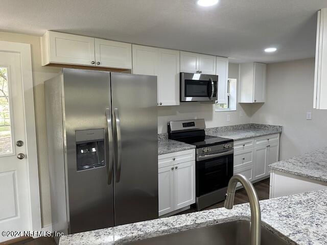 4779 Southwest 119th Loop Lake Butler, FL 32054 - Photo 33 of 49 Downstairs kitchen 6