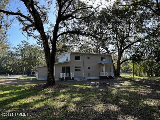 4779 Southwest 119th Loop Lake Butler, FL 32054 - Photo 4 of 49 Back of home 3
