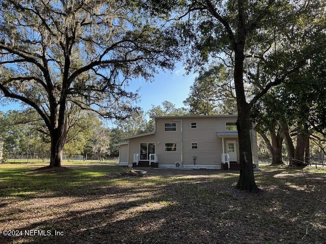 4779 Southwest 119th Loop Lake Butler, FL 32054 - Photo 5 of 49 Back of home 1