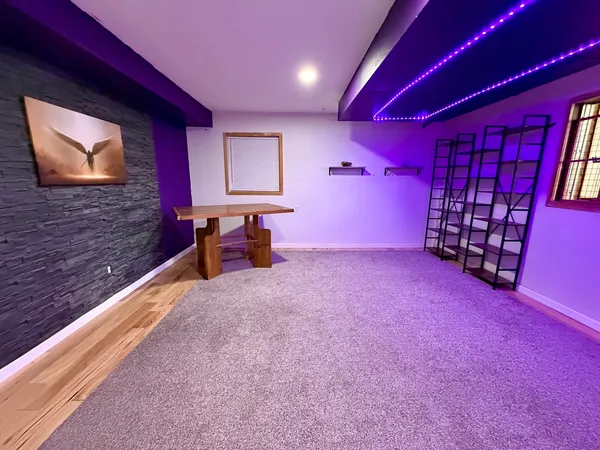 a bed room with a bed and a tv