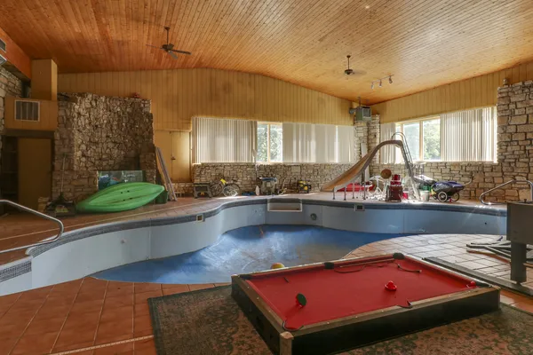 a view of a lake with houses in the back