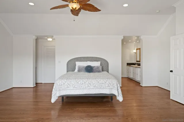 a view of a balcony with a table and chairs