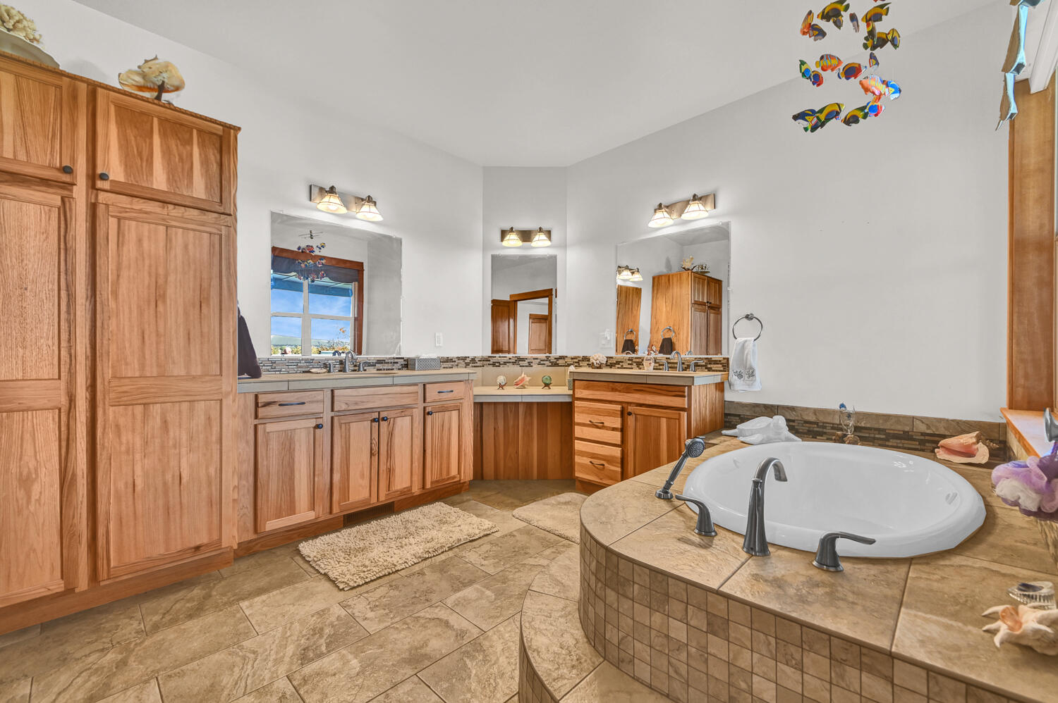 62860 Deschutes Road Bend, OR 97701 - Photo 22 of 34 Double vanity and and large built in linen cabinets