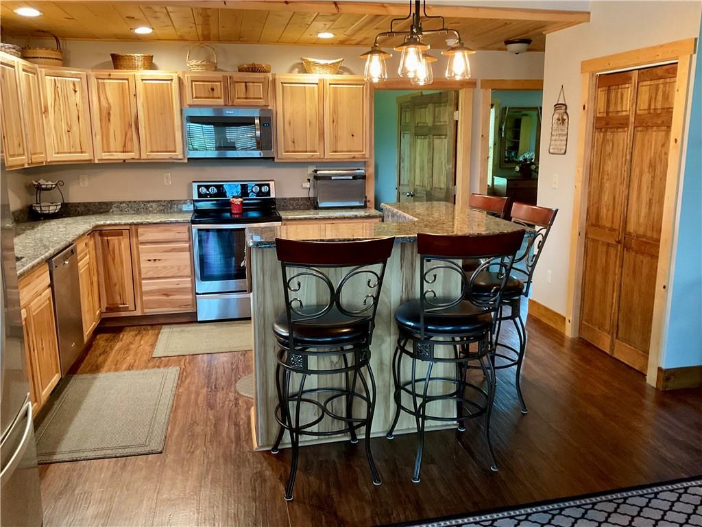 446 Saddle Road Somerset, PA 15501 - Photo 18 of 50 FABULOUS KITCHEN ISLAND/STOOLS - PANTRY DOOR ON RIGHT