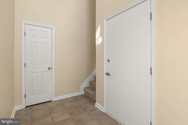 a view of an entryway with hallway