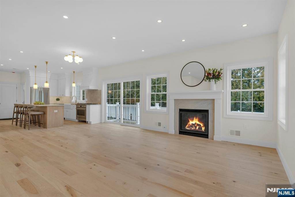 2127 Locust Road Sea Girt, NJ 08750 - Photo 11 of 48 a view of an empty room with fireplace and window