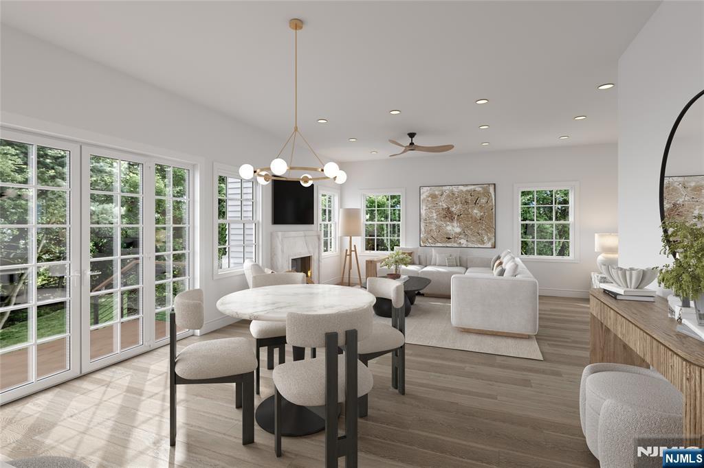 2127 Locust Road Sea Girt, NJ 08750 - Photo 12 of 48 a view of a dining room with furniture window and wooden floor